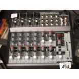 Behringer Xenyx 1202 FX mixer (working at lotting). P&P Group 1 (£14+VAT for the first lot and £1+