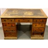 1930s oak nine drawer desk with inset top, 122 x 75 cm, for restoration. Not available for in-