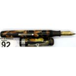 Vintage Waterman lever fill 14ct gold nib fountain pen with marbled finish. Surface scratches