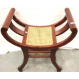 A reproduction mahogany framed savaronolla style chair with bergere seat panel. Not available for