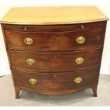 George III walnut bow front chest of three graduated long drawers with slide, raised on bracket