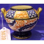 Moorcroft Macintyre painted and gilt twin handled vase, H: 10 cm. No cracks, chips or visible