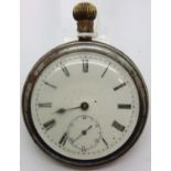 Vintage English open face crown wind pocket watch movement numbered 829381, lacking minutes hand.