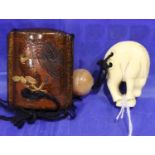 Japanese lacquered three section inro, having a signed carved ivory netsuke and a banded agate