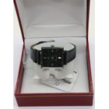 Ebel; vintage ultra slim gents wristwatch, President model with square black dial, silver hands