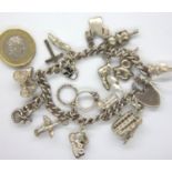 Silver charm bracelet with eighteen charms, combined 48.5g. P&P Group 1 (£14+VAT for the first lot