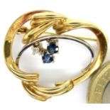 14ct gold brooch set with diamond and sapphires, 2.8g. P&P Group 1 (£14+VAT for the first lot and £