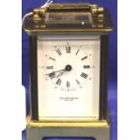 A Taylor and Bligh brass carriage clock with key, H: 11 cm, working at lotting. P&P Group 3 (£25+VAT