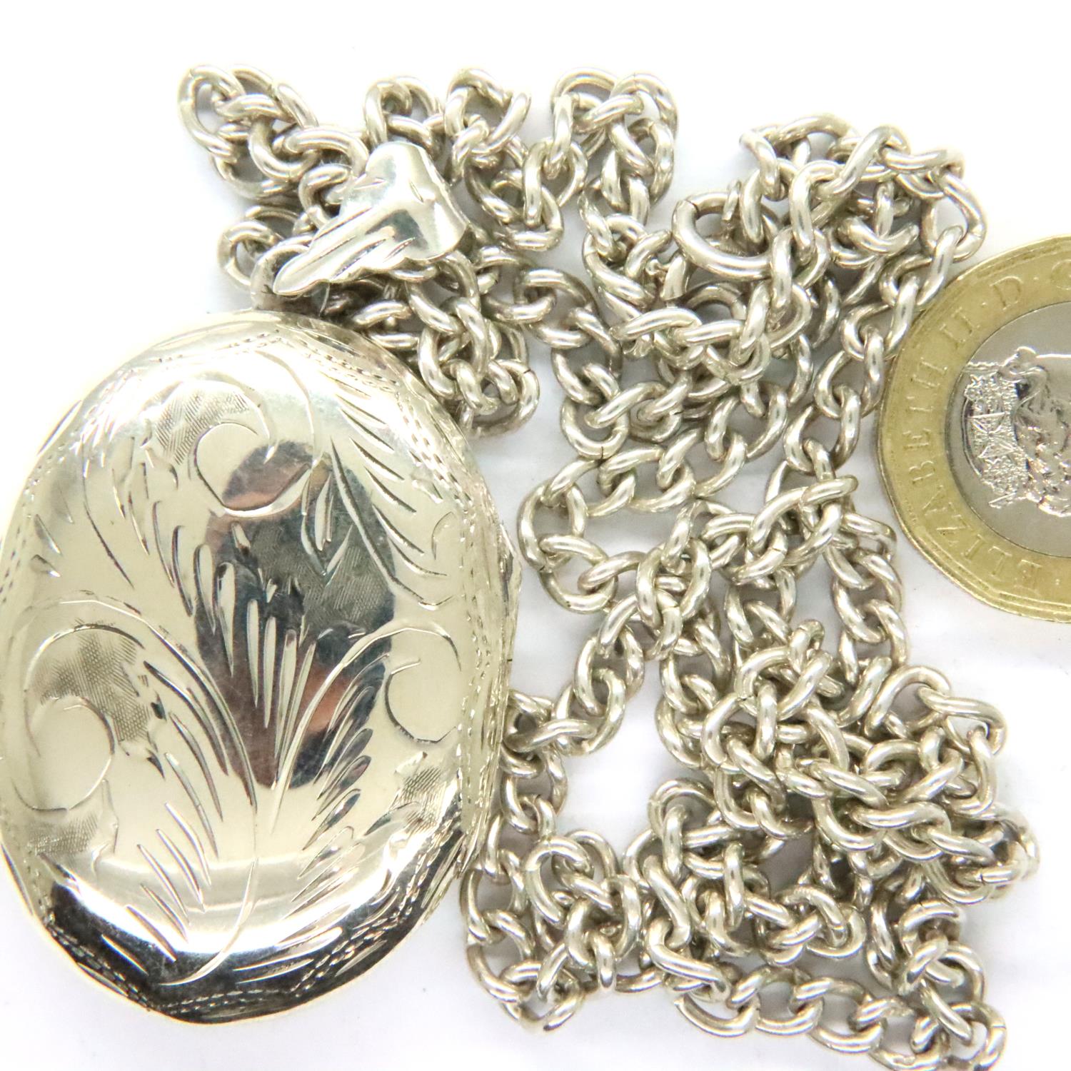 925 silver locket and neck chain. Pendant H: 4 cm, chain L: 58 cm. P&P Group 1 (£14+VAT for the