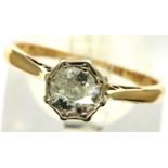 18ct gold platinum set solitaire ring, size L/M, 2.4g. Diamond chipped at one claw setting, shank