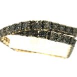 9ct gold black diamond set tennis bracelet, diamond weight totals approximately 0.5cts, L: 18 cm,