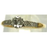 18ct gold solitaire ring with diamond set shoulders, size N/O, 1.6g. Good condition, no stones