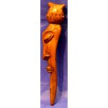 Tribal carved whistle, L: 29 cm. P&P Group 2 (£18+VAT for the first lot and £3+VAT for subsequent