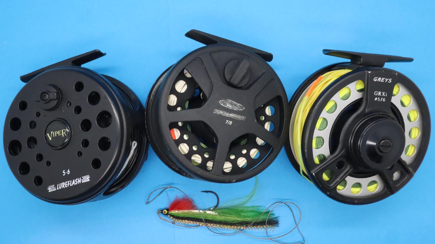 Three fly reels including Greys GRX 1516 in a Greys bag. P&P Group 2 (£18+VAT for the first lot