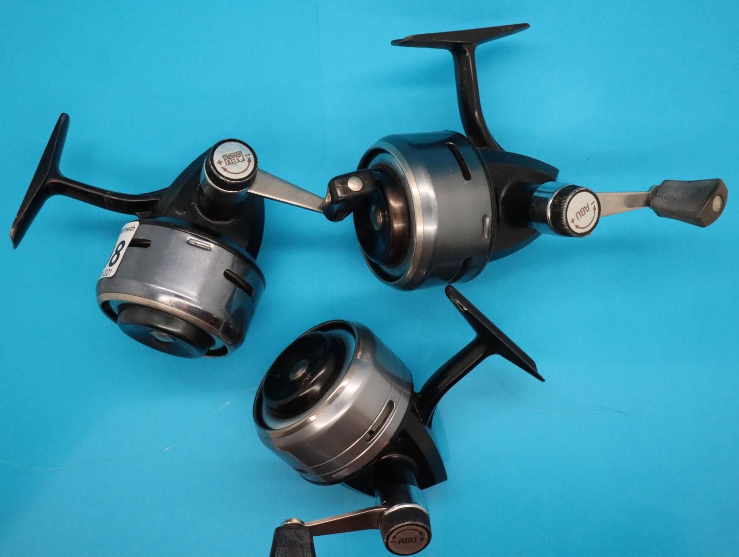 Three Abu 506 closed faced fishing reels. P&P Group 2 (£18+VAT for the first lot and £3+VAT for