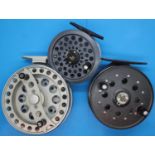 Three fly fishing reels including Okuma aventa, Shakespeare model 2626 and striker right ultraflo.