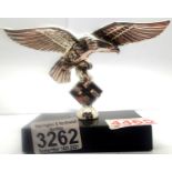 A modern chromed Luftwaffe eagle desk ornament on a marble plinth. P&P Group 2 (£18+VAT for the