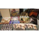 Mixed Beatles LPs including Sgt Pepper and Help. P&P Group 2 (£18+VAT for the first lot and £3+VAT