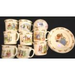 Royal Doulton Bunnykins; eight mugs, six plates and a money box. No cracks, chips or visible