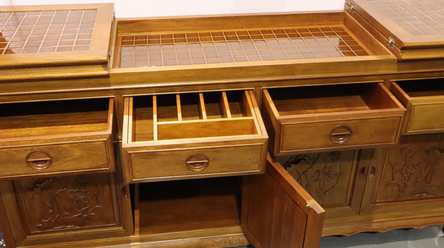 An Oriental hardwood sideboard buffet, the cupboard doors with carved facias and folding top with - Image 4 of 5