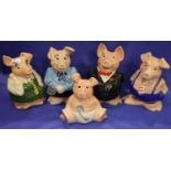 Family of five NatWest pig money boxes with NatWest stoppers. Not available for in-house P&P,