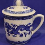 Oriental blue and white lidded pot, with four character mark to base, H: 12 cm. P&P Group 1 (£14+VAT