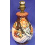 A Moorcroft lamp and shade, H: 20 cm. Crazing throughout, otherwise no cracks, chips or visible