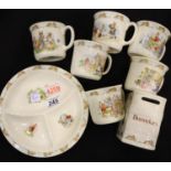 Royal Doulton Bunnykins; six mugs, divided bowl and a money box. Not available for in-house P&P,