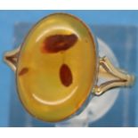 9ct gold amber set ring, size N, 2.7g. P&P Group 1 (£14+VAT for the first lot and £1+VAT for