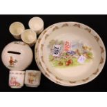 Royal Doulton Bunnykins; four plates, two bowls, five egg cups and a money box. Not available for
