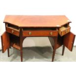 A 19th century mahogany sideboard of three drawers and two cupboards, raised on tapering supports,