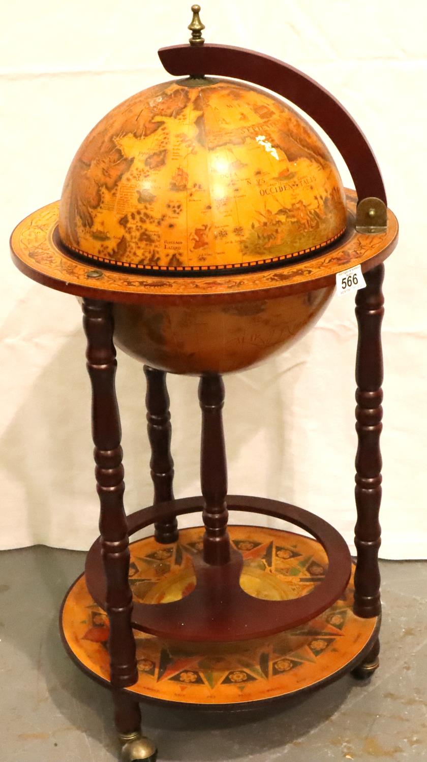 A reproduction drinks globe of small proportions H: 86 cm, some loss of paper too globe. Not