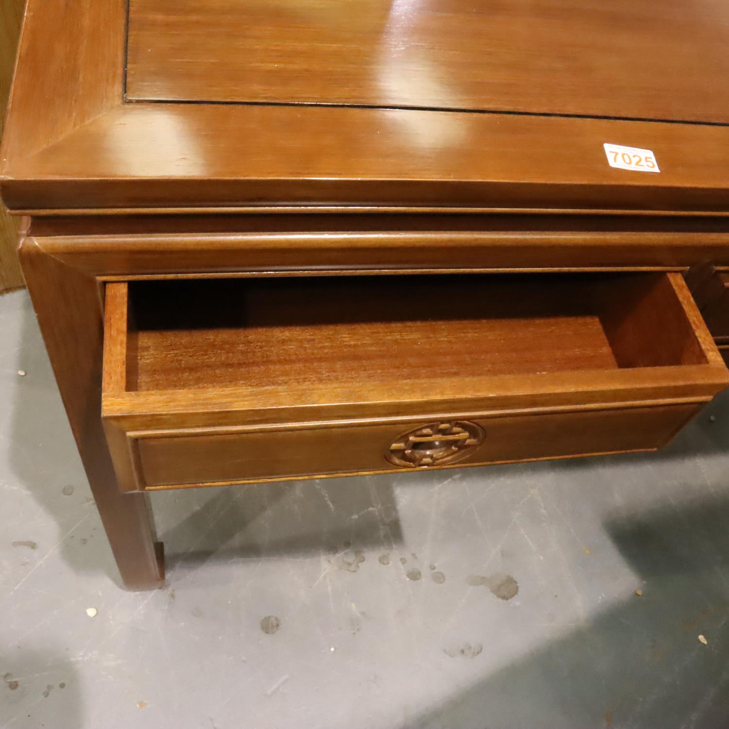 A contemporary three drawer console table in oriental hardwood with carved hand pulls, 153 x 52 x 84 - Image 2 of 3