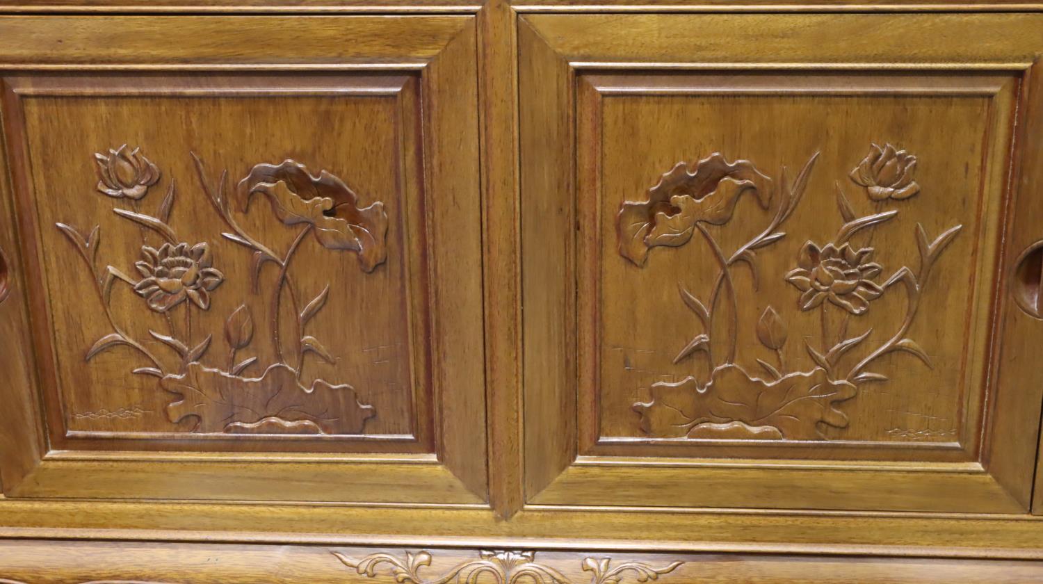 An Oriental hardwood sideboard buffet, the cupboard doors with carved facias and folding top with - Image 5 of 5