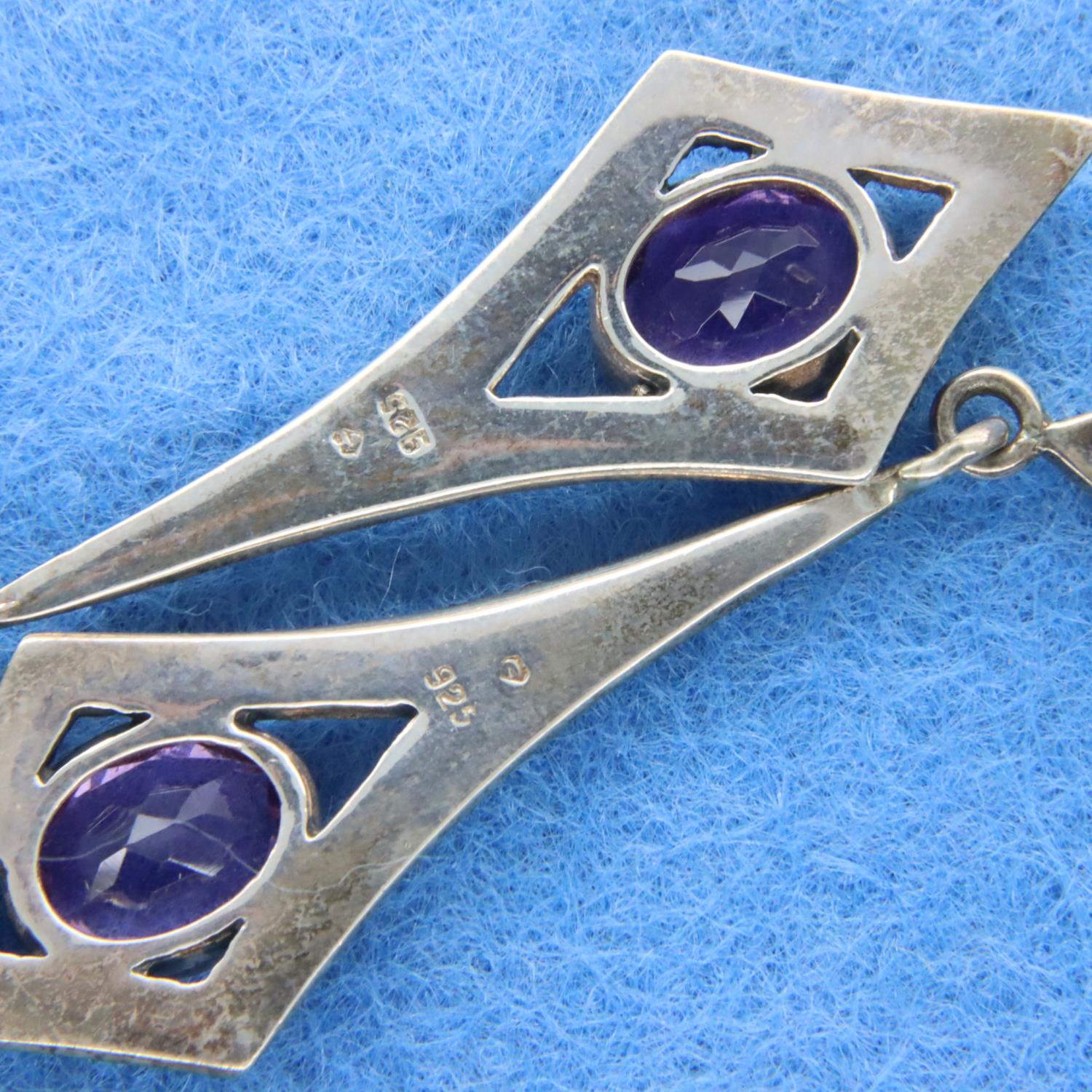 A pair of amethyst and marcasite silver earrings. P&P Group 1 (£14+VAT for the first lot and £1+ - Image 2 of 2