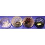 Four vintage Caithness Scottish glass paperweights. P&P Group 2 (£18+VAT for the first lot and £3+