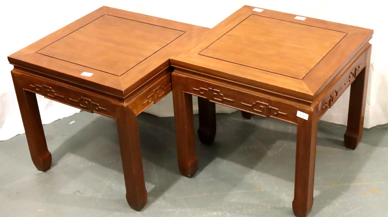 A pair of Oriental hardwood square lamp tables, each 54 x 54 x 51 cm H. Not available for in-house