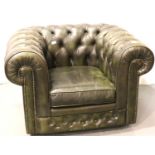 20th century green leather Chesterfield buttoned tub chair, 105 x 85cm. Not available for in-house