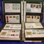 Four albums of Channel Island stamps. Not available for in-house P&P, contact Paul O'Hea at