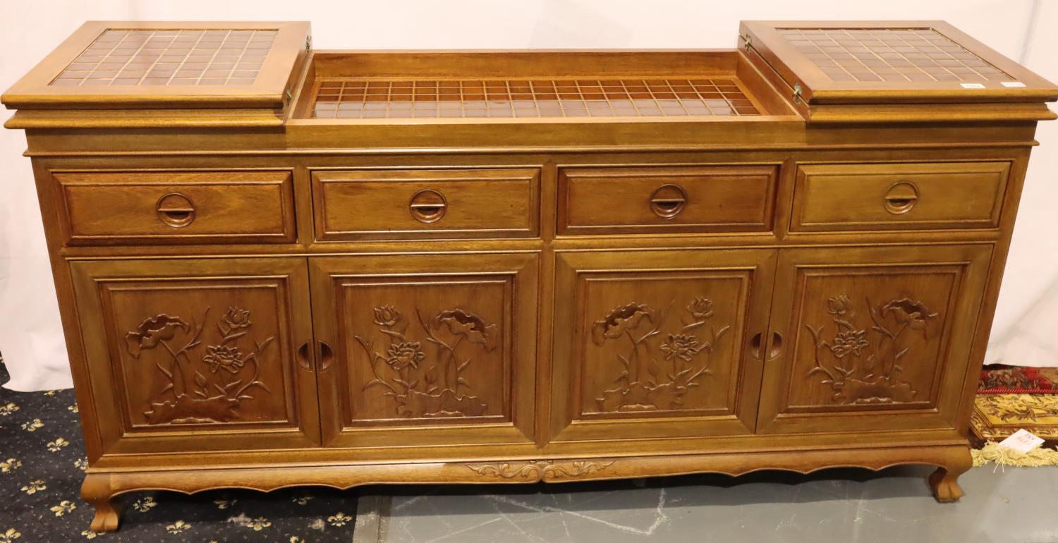 An Oriental hardwood sideboard buffet, the cupboard doors with carved facias and folding top with - Image 2 of 5