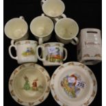 Royal Doulton Bunnykins; six twin handled mugs, three bowls and a money box. Not available for in-