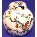Oriental ginger jar with Prunus decoration, H: 11 cm. P&P Group 1 (£14+VAT for the first lot and £