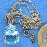 Large blue topaz and marcasite pendant on a silver chain. P&P Group 1 (£14+VAT for the first lot and