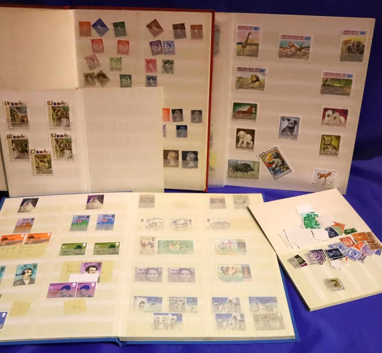 Three stock albums of GB Mint and used stamps and two others including Disney. P&P Group 1 (£14+