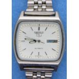 Seiko; gents automatic wristwatch on stainless steel bangle strap, working at lotting. Surface