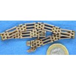 Edwardian 9ct rose gold gate bracelet, L: 18 cm, 19.6g, one link has been filed and acid tested. P&P