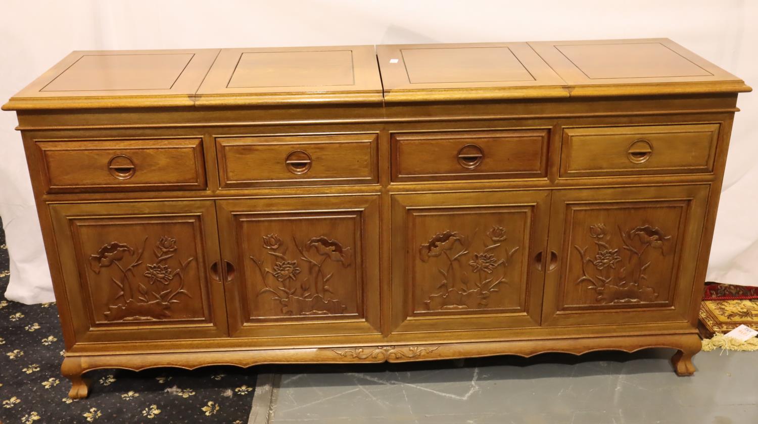 An Oriental hardwood sideboard buffet, the cupboard doors with carved facias and folding top with - Image 3 of 5