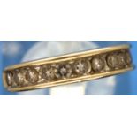 9ct gold channel set diamond set half eternity ring, size K/L, 2.3g. P&P Group 1 (£14+VAT for the