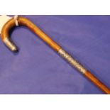 Ladies silver collared walking stick, L: 84 cm. P&P Group 2 (£18+VAT for the first lot and £3+VAT