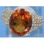 9ct gold citrine ring, set with diamond shoulders, size N/O, 4.0g. P&P Group 1 (£14+VAT for the